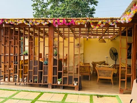 The outdoor garden setting at Royal Maricay Hotel